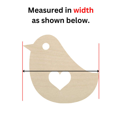 a wooden cutout of a bird with a heart