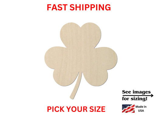 a four leaf clover cut out of wood