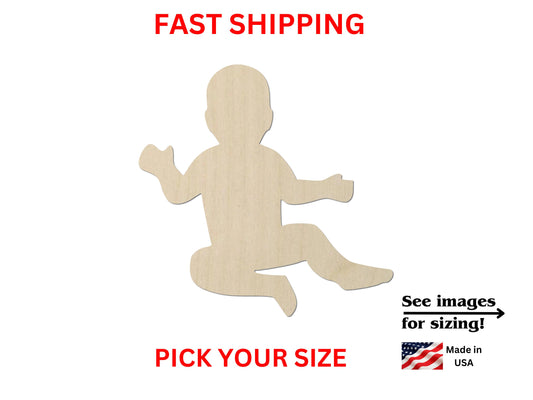 a wooden cutout of a baby running