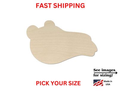 a wooden cutout of a bear on a white background