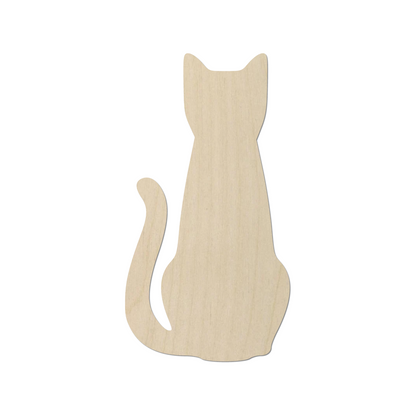 a wooden cutout of a cat on a white background