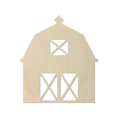 a wooden cutout of a barn